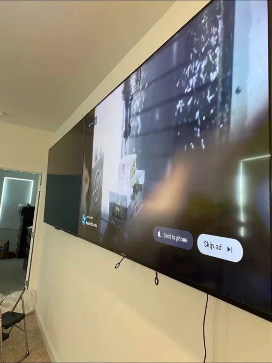 Wall-mounted television