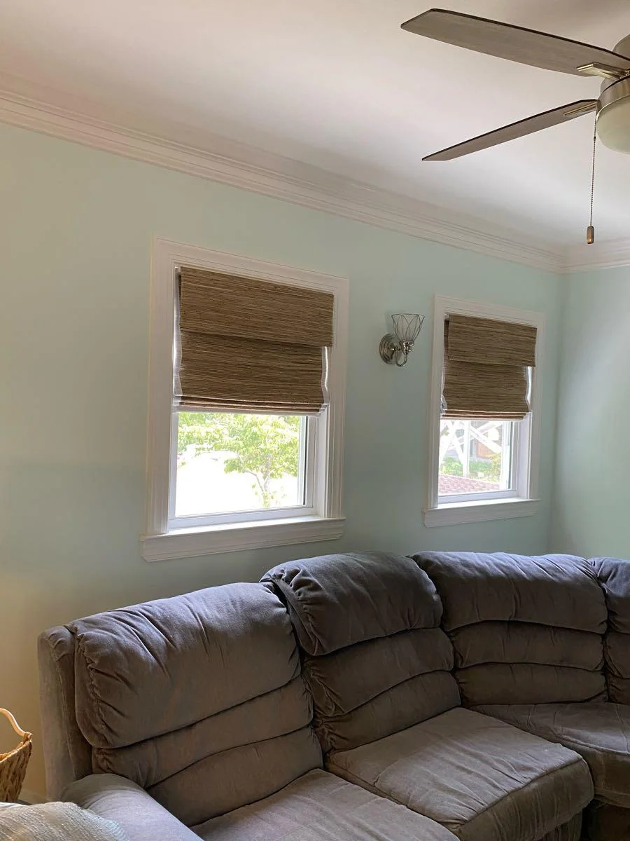 Woven window shades in a living room