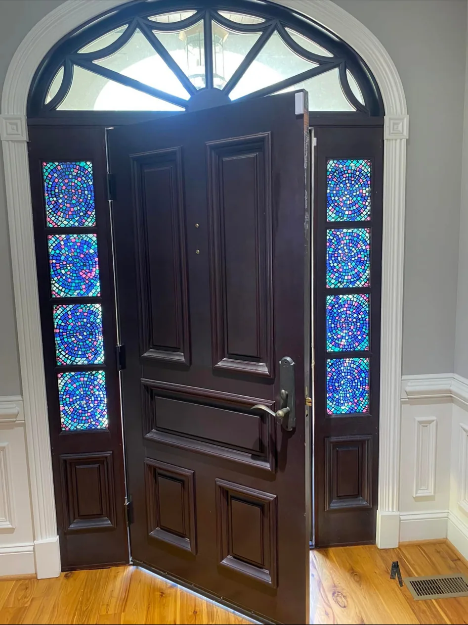 Decorative privacy film around an entry door